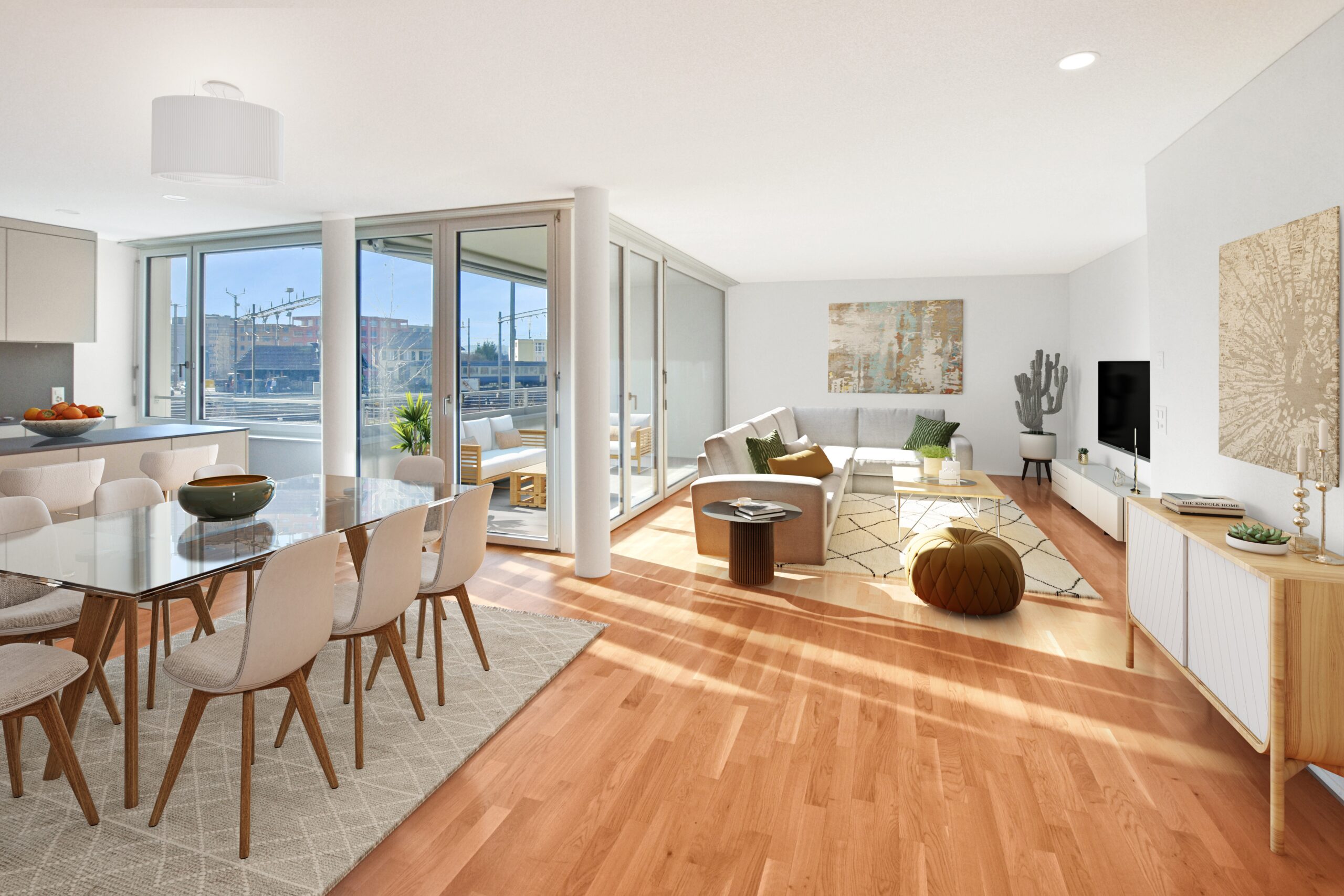 Un salon et une salle à manger ouverts, spacieux et modernes, avec de grandes fenêtres. Des sols en bois, une table à manger avec huit chaises, un canapé d'angle confortable, une télévision sur pied et la vue sur l'extérieur renforcent l'atmosphère lumineuse et aérée. Des œuvres d'art et une plante de cactus font partie de l'aménagement.